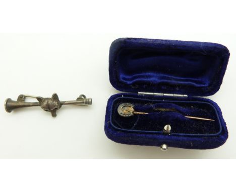 Victorian horseshoe stick pin in original box and silver brooch depicting a fox and horn, Birmingham 1910