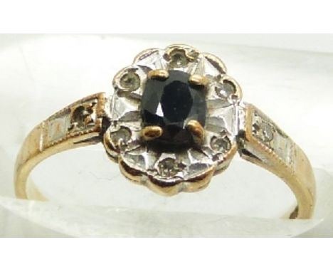 A 9ct gold ring set with a sapphire and diamonds, 1.6g, size K&nbsp;