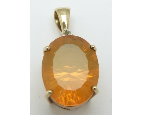 A 9ct gold pendant set with an oval mixed cut fire opal, 3.7g