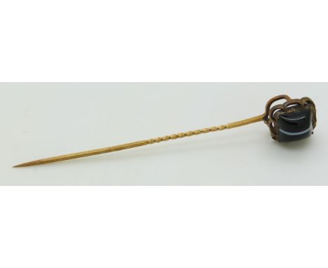 Victorian stick pin set with banded agate, length 8cm