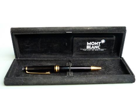 Montblanc ballpoint pen with black resin barrel and cap, gilt fittings and star cap