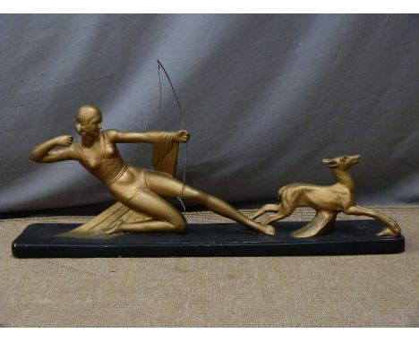 An Art Deco statue of Diana the Huntress, signed S. Melani, length 78cm