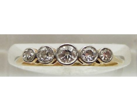 An 18ct gold ring set with five diamonds, 1.9g, size J/K&nbsp;