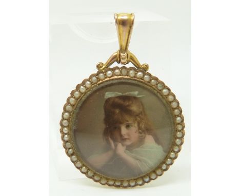 A 9ct gold locket set with a portrait miniature surrounded by seed pearls, 3cm diameter&nbsp;