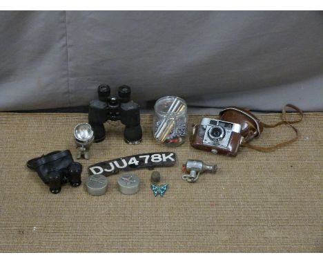 Vintage motorbike number plate, Miller headlight and dynamo, Liberman binoculars, Agfa camera, Sheaffer white metal pen, thre