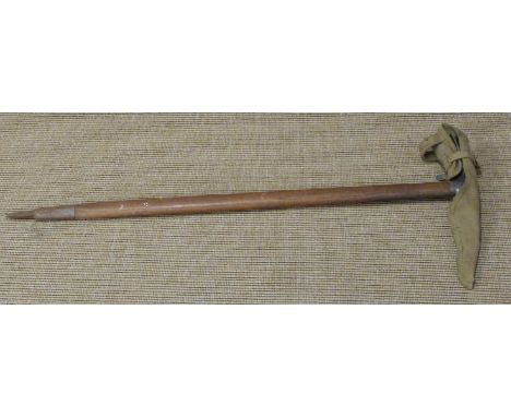 Vintage ash handled ice climbing axe marked Claudius Simond Chamonix Mont Blanc with alpaca head logo, length 84cm