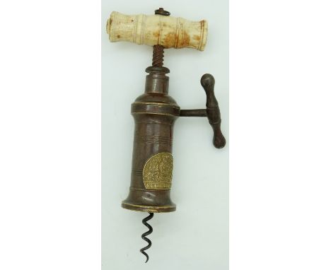 Victorian Heeley &amp; Sons side action corkscrew with bone handle and set with royal coat of arms.