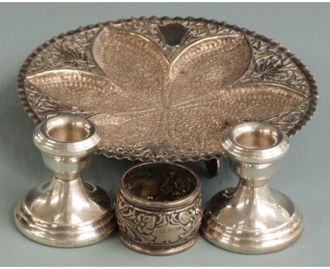 Persian or similar white metal pieced and footed dish, diameter 18cm weight 150g, two hallmarked silver candlesticks and a ha