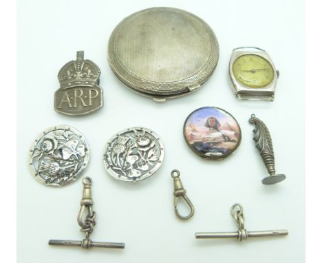 A collection of silver items including compact, buttons, Scottish silver watch, seal, ARP brooch etc