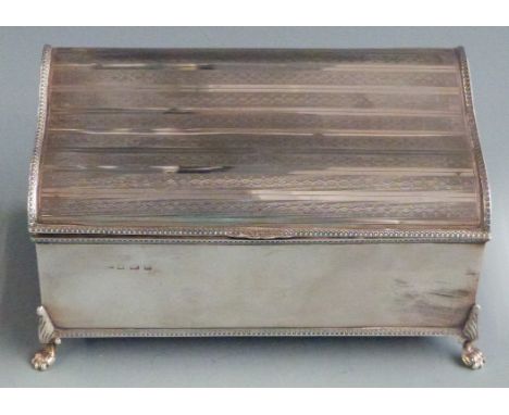 George V hallmarked silver cigarette or jewellery box with shaped engine turned lid, raised on four feet, Birmingham 1932 mak