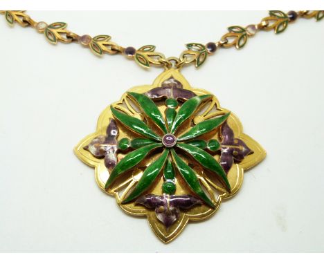 A 9ct gold bespoke necklace set with purple and green enamel, in original box with original coloured design, pendant 4.3cm, 3