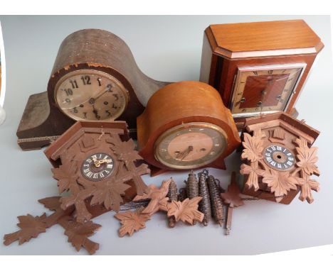 A group of clocks for the restorer to include two German cuckoo clocks and three circa 1930's mantel clocks including a three