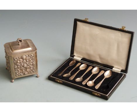 Seven hallmarked silver teaspoons in case, 48g together with an embossed plated tea caddy.&nbsp;