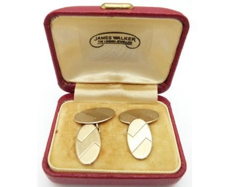 A pair of 9ct gold cufflinks with engine turned decoration, 5.6g