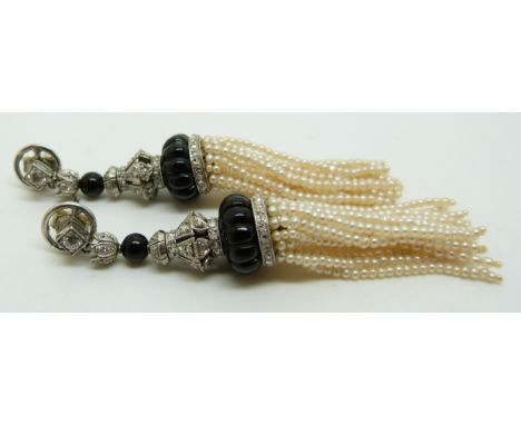 A pair of 9ct white gold Art Deco chandelier earrings set with old cut diamonds and onyx and with seed pearl drops, 6cm long&