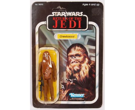 A rare original vintage Kenner made Star Wars carded action figure MOC ' Chewbacca '. 65 back Return Of The Jedi card. The fi