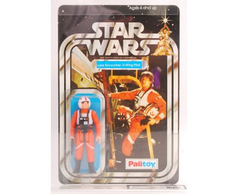 An incredibly rare vintage ex-shop stock condition Palitoy made Star Wars carded MOC action figure ' Luke Skywalker - X Wing 