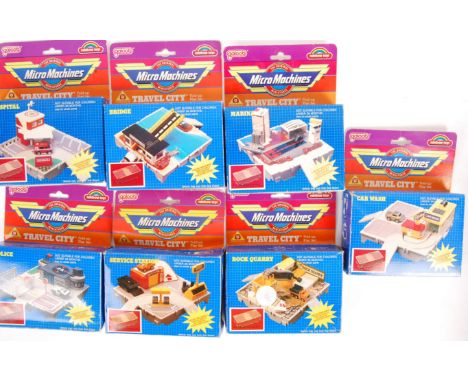 A collection of 7x vintage Galoob made Micro Machines Travel city sets to include; Marina, Bridge, Car Wash, Rock Quarry, Pol