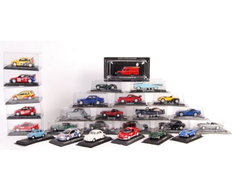 A collection of 26 Deagostini 1/43 scale diecast models mounted on plastic bases most retaining original plastic outer boxes 