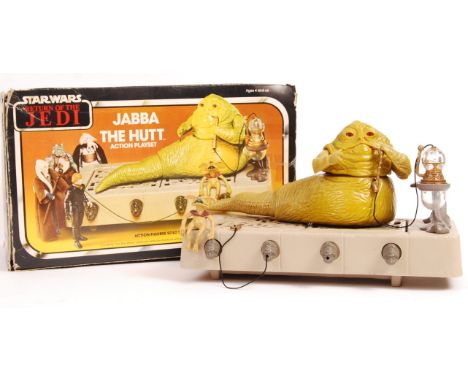 An original vintage Kenner made action figure playset ' Jabba The Hutt Action Playset '. 100% complete, within the original R