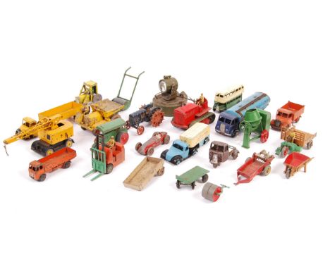 An assorted collection of early / vintage diecast model vehicles and related accessories. To include; a rare Astra lead / tin