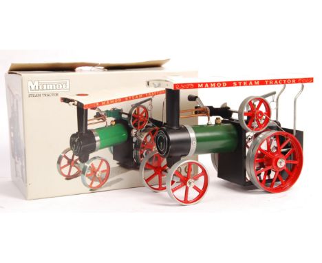 A vintage Mamod Live Steam ' Steam Tractor ' / Traction Engine. Appears to have been very little used (likely only fired once
