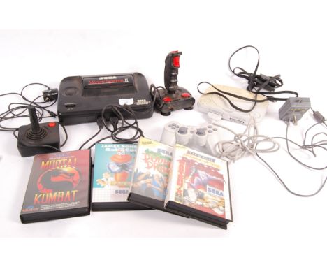 A retro Sega Master System video games computer console with accessories and games to include; Mortal Kombat (boxed, no instr