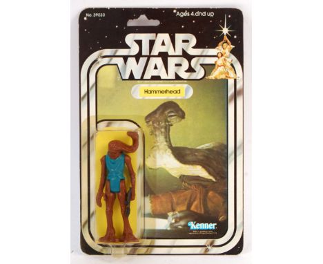 A rare ex-shop stock condition original vintage Kenner made Star Wars MOC carded action figure ' Hammerhead '. Incredible ori