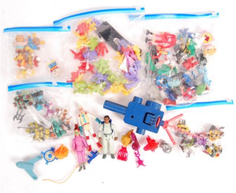 A collection of assorted vintage 1980's toys and figure to include; Ghostbusters, Getalong Gang, Monsters In My Pocket, Gallo