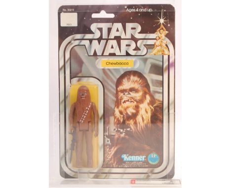 A rare vintage ex-shop stock Kenner made Star Wars carded MOC action figure ' Chewbacca '. AFA Graded (80 - C80, B85, F90). R