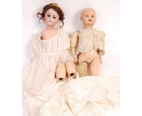 Two early 20th century antique dolls - the first being likely a German made bisque headed doll, stamped to rear of head ' 191