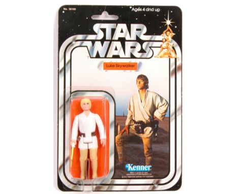 An incredibly rare vintage Kenner made Star Wars carded MOC action figure ' Luke Skywalker '. Rare 21 back ( 21B ) card. Mint