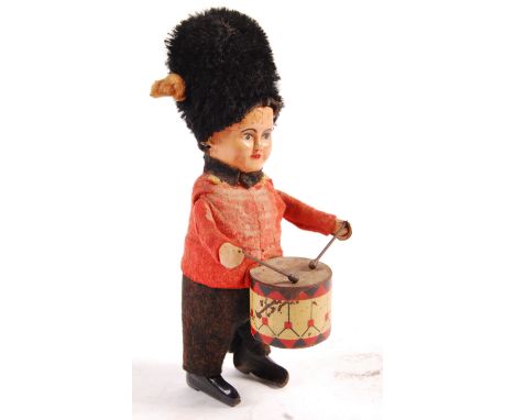 A rare antique vintage 1930's pre war German Schuco made clockwork tinplate wind up toy No. 993 British Soldier Guardsman Dru