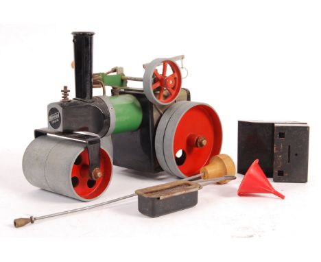 An original vintage Mamod live steam model Traction Steam Engine complete with turning stick, liquid fuel burner and funnel. 