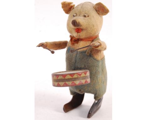 A rare antique vintage 1930's pre war German Schuco made clockwork tinplate wind up toy Pig with drum from Disney Three Littl