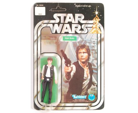 A rare vintage Kenner made ex-shop-stock condition Star Wars carded MOC action figure ' Han Solo '. Large-head variation, 20 