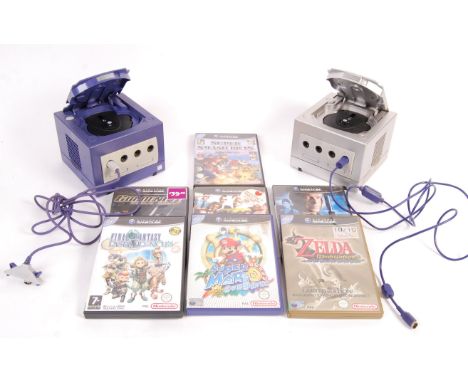 A collection of Nintendo Gamecube video games computer consoles with games to include; silver Gamecube console with official 