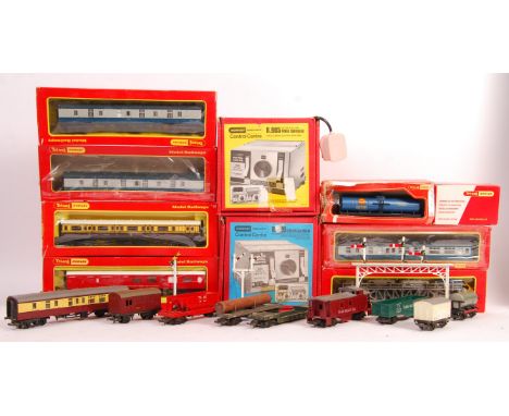 A collection of vintage Triang / Hornby 00 Gauge model railway train set rolling stock and accessories comprising: five boxed