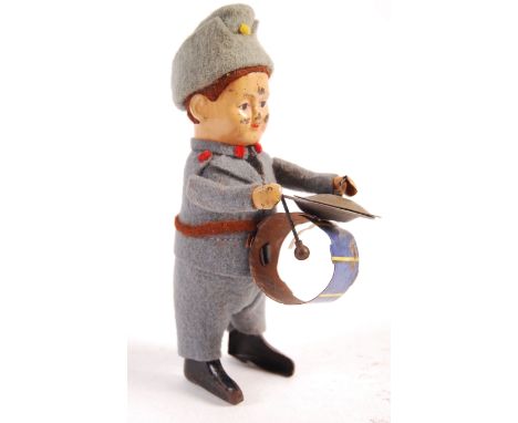 A rare antique vintage 1930's pre war German Schuco made clockwork tinplate wind up toy No. 985 Swiss Soldier Drummer with Cy