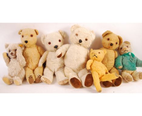 A collection of 7x assorted vintage stuffed toys teddy bears to include Steiff (brown mohair ear tag present), three golden m