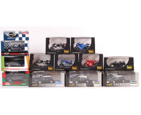 A collection of 14 boxed 1/43 and 1/24 scale diecast Mini Coopers and motorbikes comprising: Six 1/24 scale IXO motorbikes, I