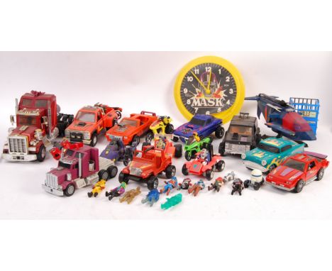 A large collection of original vintage 1980's Kenner made MASK loose figures and vehicles to include; Boulder Hill (appears c