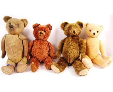 A collection of x4 vintage post-war teddy bears. To include; a large 20" American Knickerbocker teddy bear (brown mohair, boo