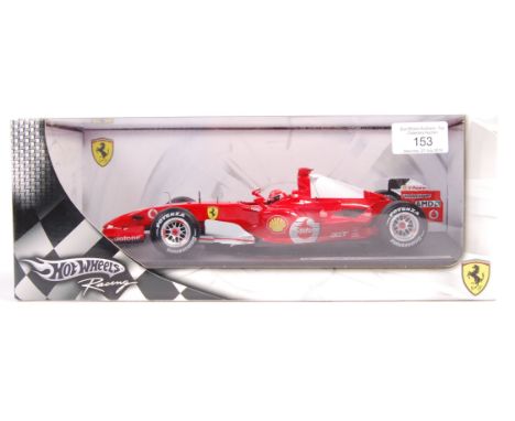 A Mattel made Hot Wheels Racing precision diecast 1:18 scale model Formula 1 racing car ' 248 F1 - Michael Schumacher '. High