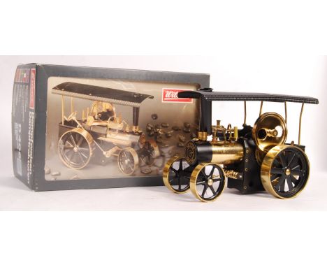 A vintage Wilesco made Live Steam ' Dampfwalzen ' traction engine / tractor. Appears little used, within it's original box. C