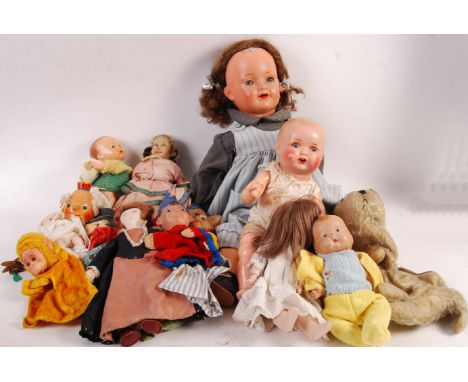 A collection of assorted dolls and puppets to include Handwerck HW baby porcelain doll, larger German doll, antique doll, var