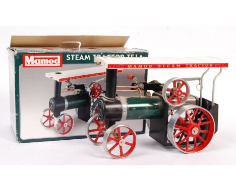 A Mamod made Live Steam ' Tractor TE1A ' steam engine. Appears mint and unfired (solid fuel). Complete with it's original box