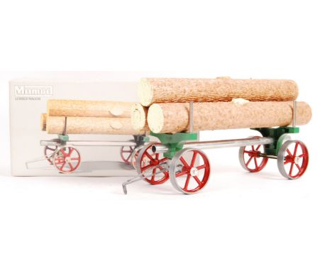 An original vintage Mamod boxed live steam model Lumber Wagon trailer complete in original box and booklet with faux log load