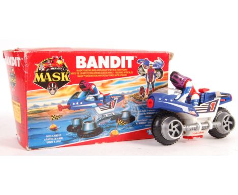 An original vintage 1980's Kenner made MASK action figure playset 'Bandit' Mask Racing Bike / Hovercraft With Action Figure. 