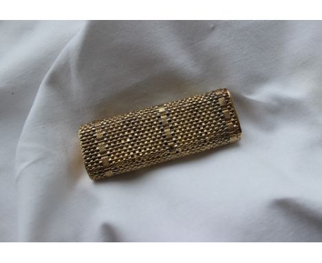 An 18ct yellow gold Cartier lighter, with a basket weave body, the base marked No.35859T, 6.5cm high, approximately 88.5 gram